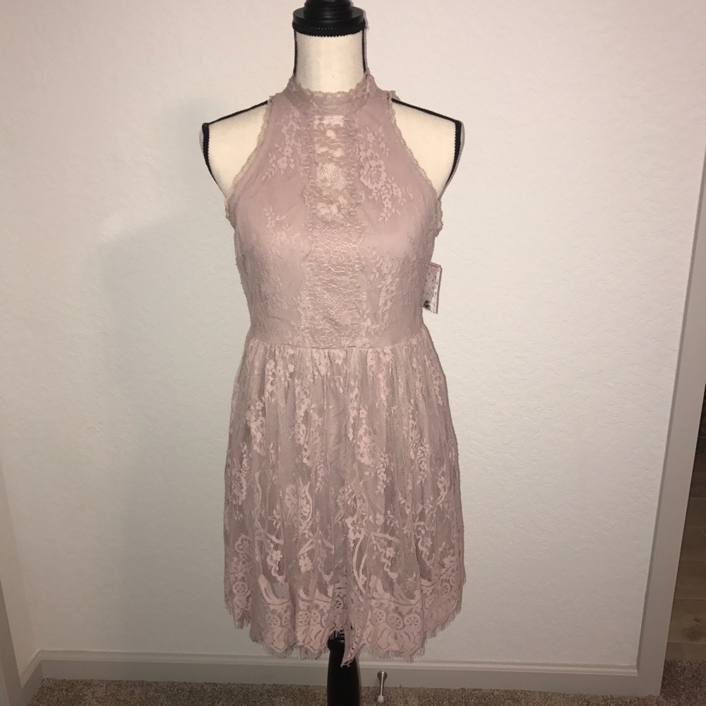 FREE PEOPLE SIZE 4 BRAND NEW ROMPER WITH TAGS!