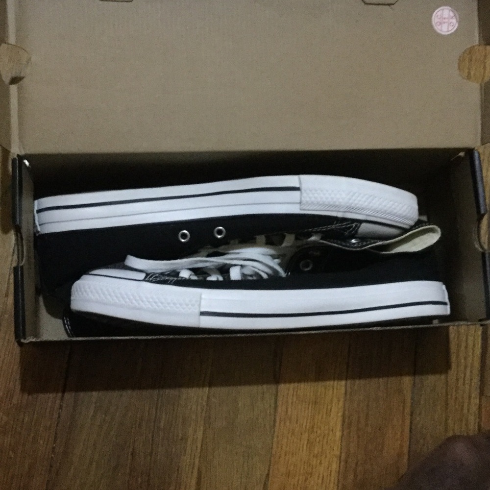 Black and white high top converse