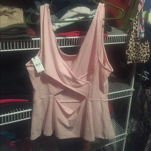 Express peplum tank with cut out back