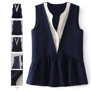 Sleeveless layered plunge skirted blouse.