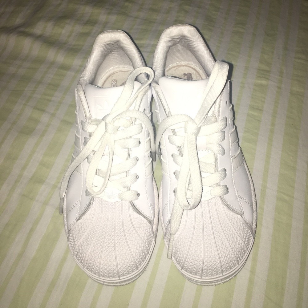 All white Adidas superstars