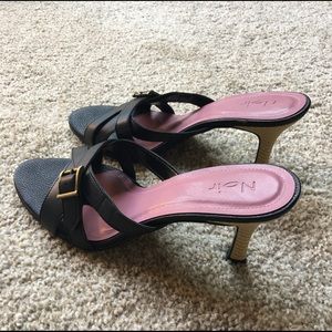 Black heeled slip on sandals