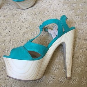 Teal and wood pumps