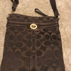 Signature coach messenger crossbody