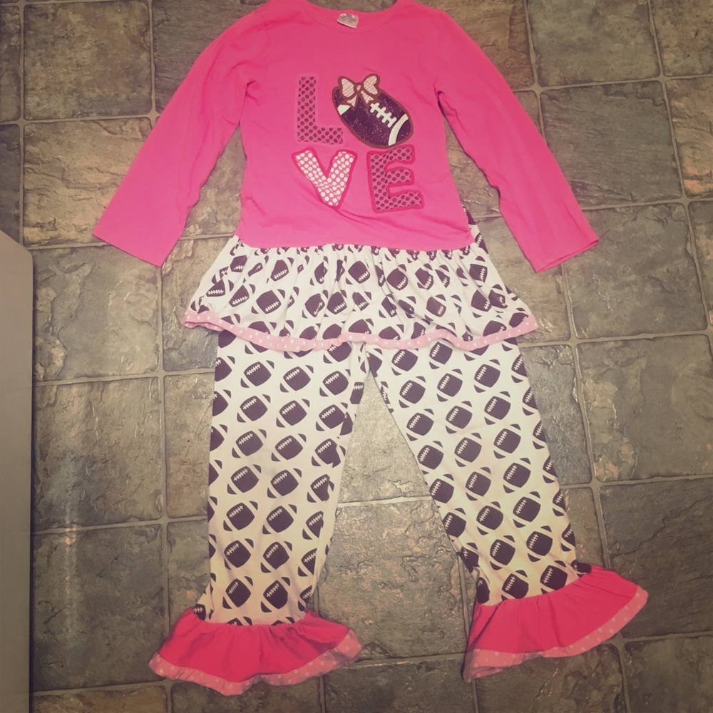 Football and ruffles outfit.