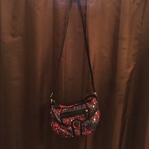 Red and black Kipling bag.