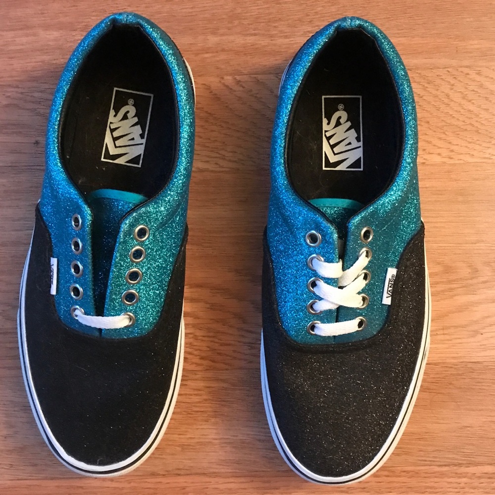 Blue and black metallic Vans