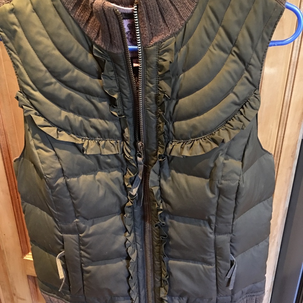 A juicy couture brand green vest . Size large.