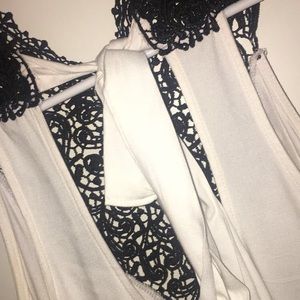 White dress with detailing at top