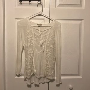 Long sleeved white floral top