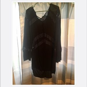 Long black flutter sleeve top from Torrid