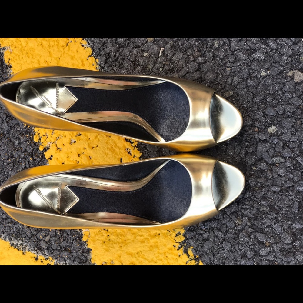 Lightly worn Brian Atwood Gold Peep toe Pumps