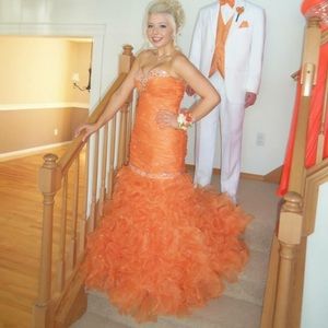 Selling my orange chiffon prom dress