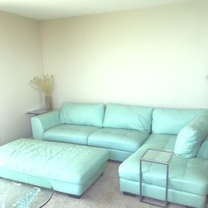 Mint green leather sectional.