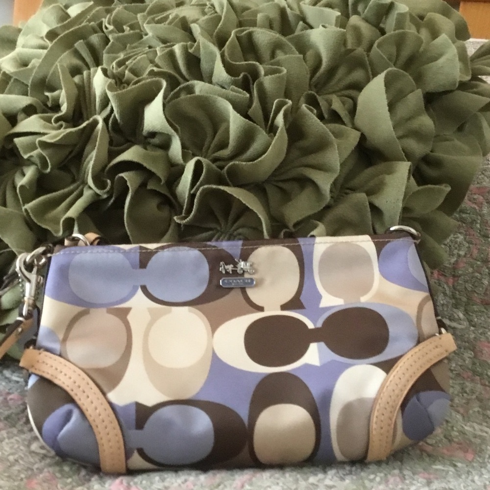 Authentic Coach wristlet.