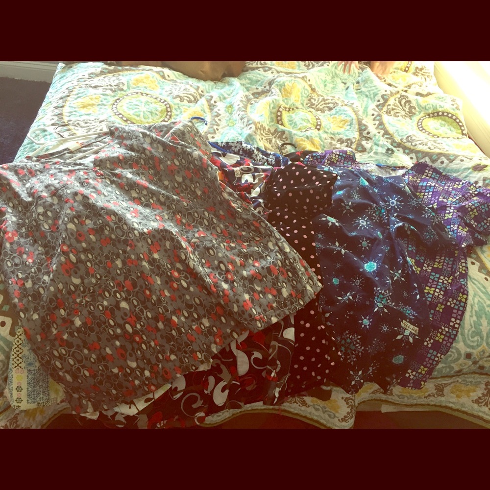 11 pairs of nursing scrub shirts