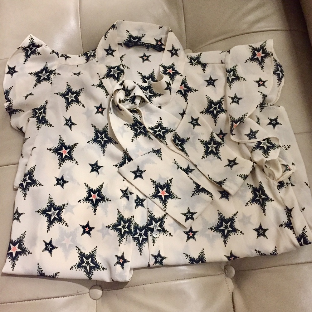 Beige XS Zara top with stars.