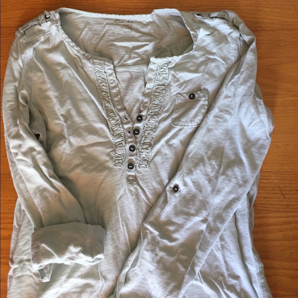 Pale teal T