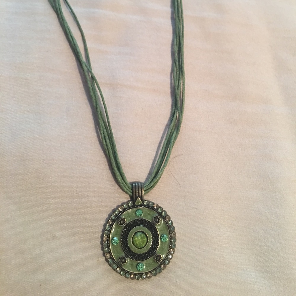 Green pendant on rope necklace