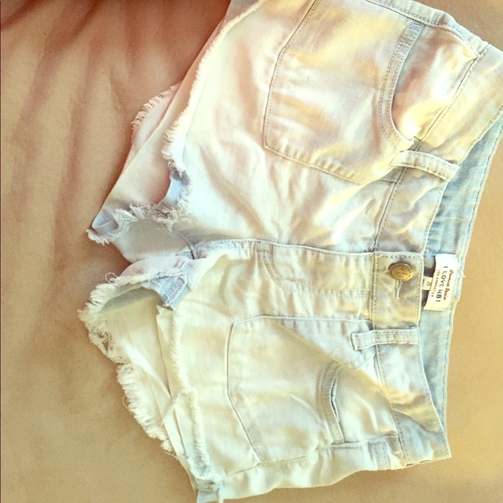 Blue and white shorts the colors are almost ombred