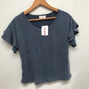 // Navy blue ruffled shoulder blouse //