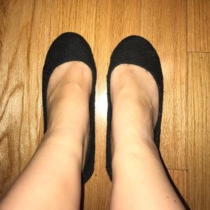 Black knitted flats