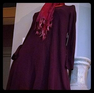 SOLD.  Long sleeved mini dress