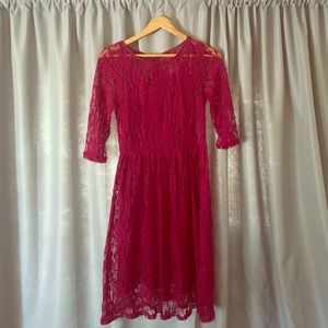 Fushia lace dress with 3/4 length sleeves.