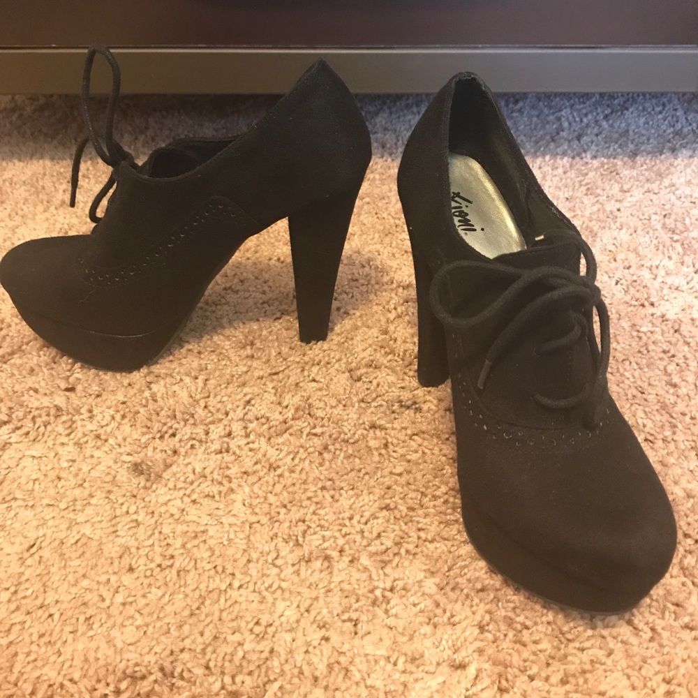 Black suede pumps