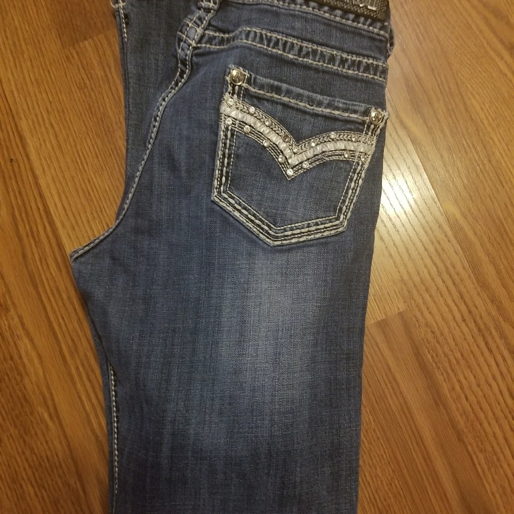 Size 29x34 mid waist rock and roll jeans