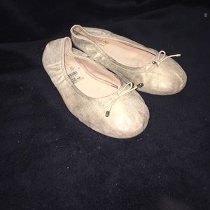 Gold tone American Eagle flats