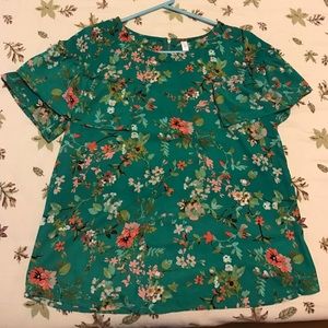 Green blouse with floral design