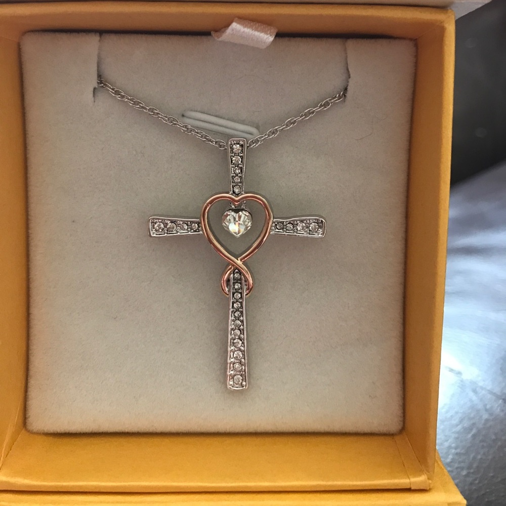 Sterling silver and rose gold cross