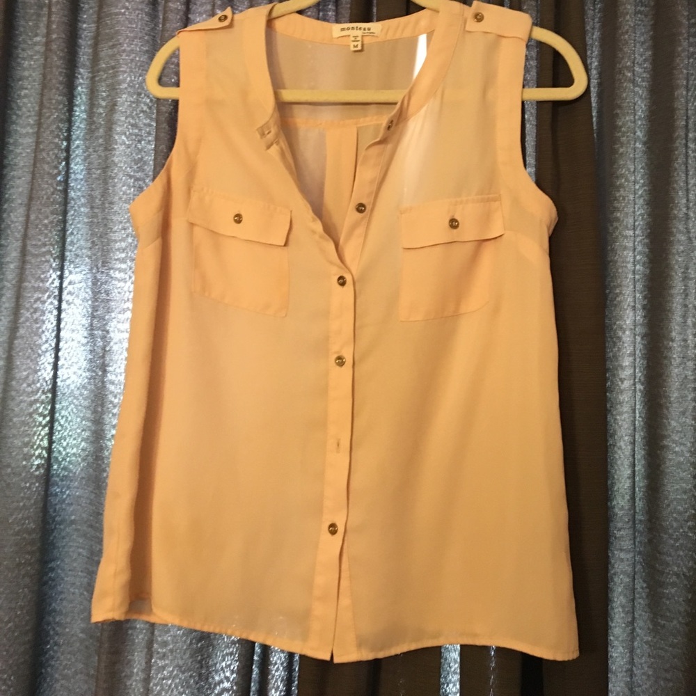 Cream sleeveless blouse