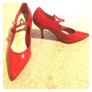 Red Mary Jane pointed pumps