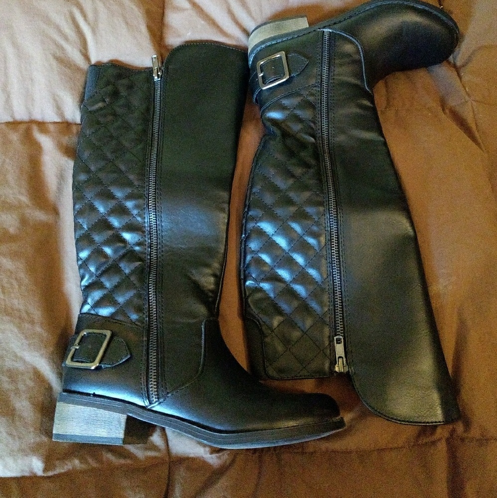 Tall black boots