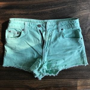 Green jean shorts