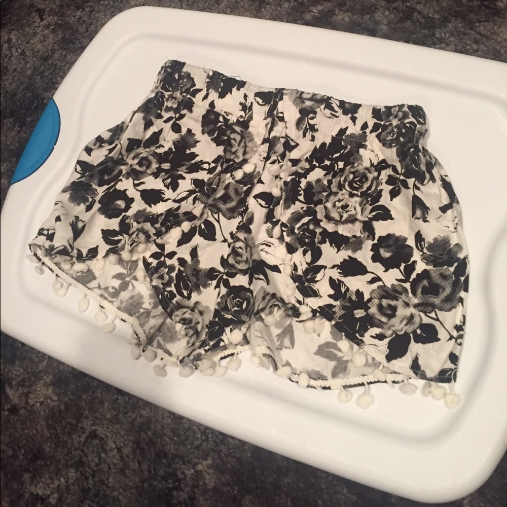 Floral , Pom Pom shorts.