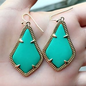 Kendra Scott turquoise Alex earrings.