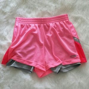 Neon pink kids running shorts