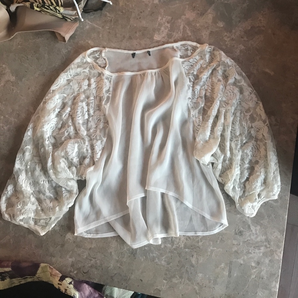 Sheer white blouse with lace