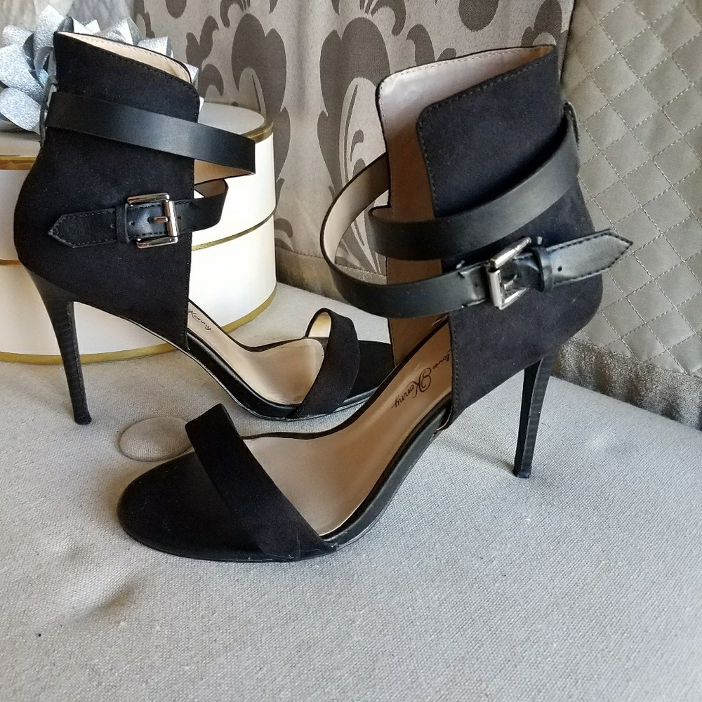 Black high heels with ankle straps