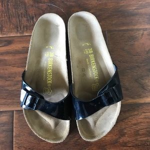 Black patent single strap Birkenstocks size 38