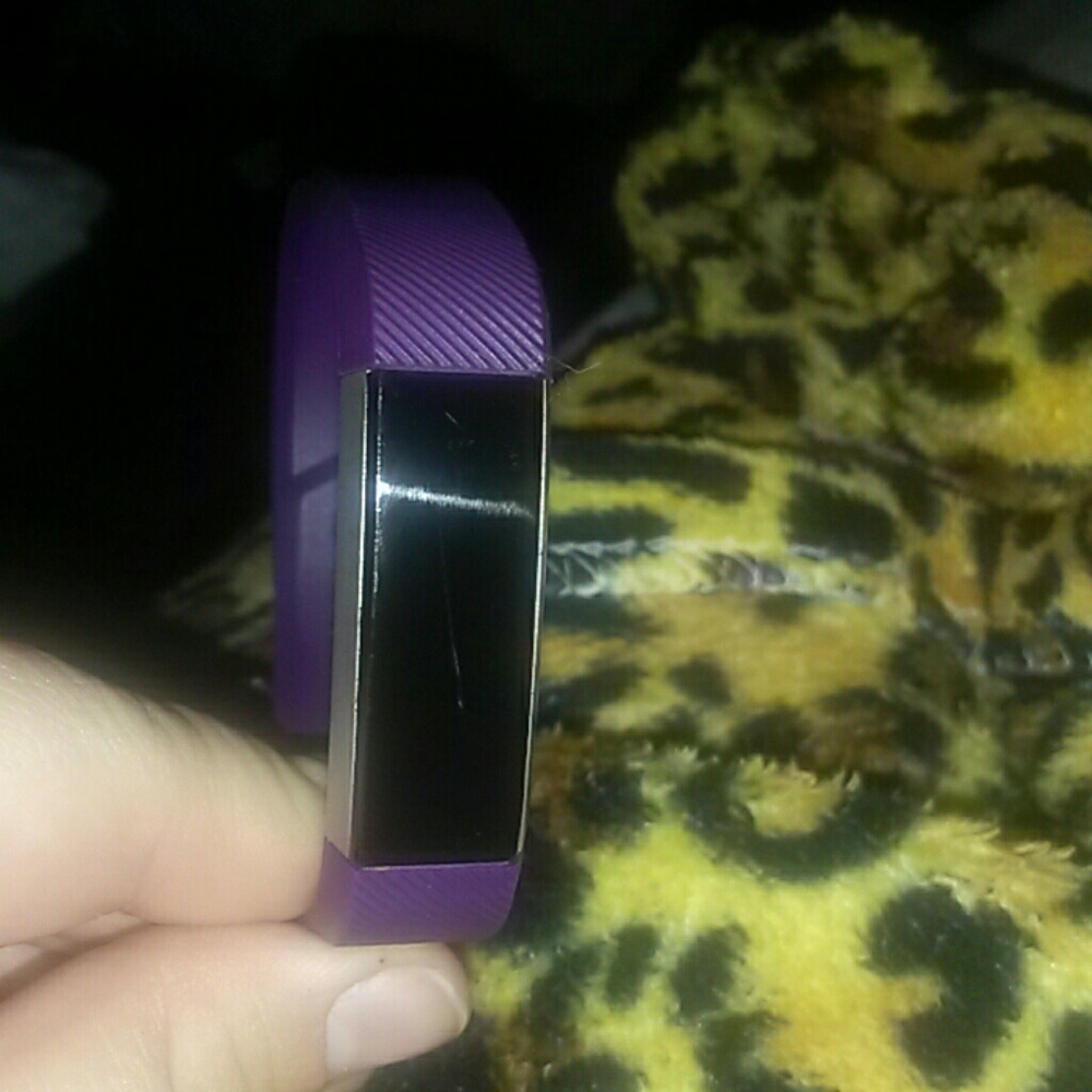 Fitbit Alta with a black band and a purple band