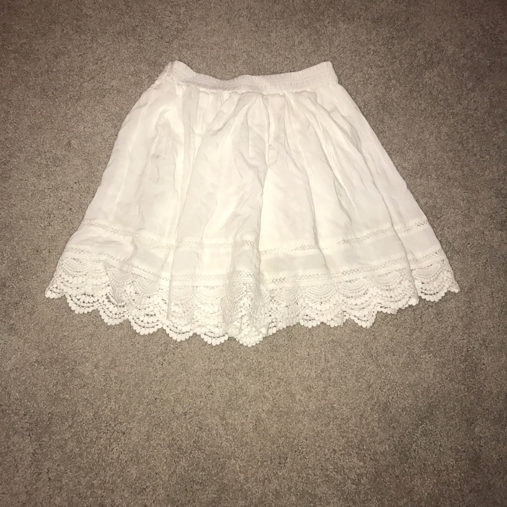 White skirt with scalloped detailing