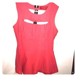 Pink cut out peplum top