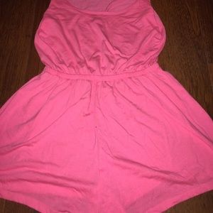 Pink romper.