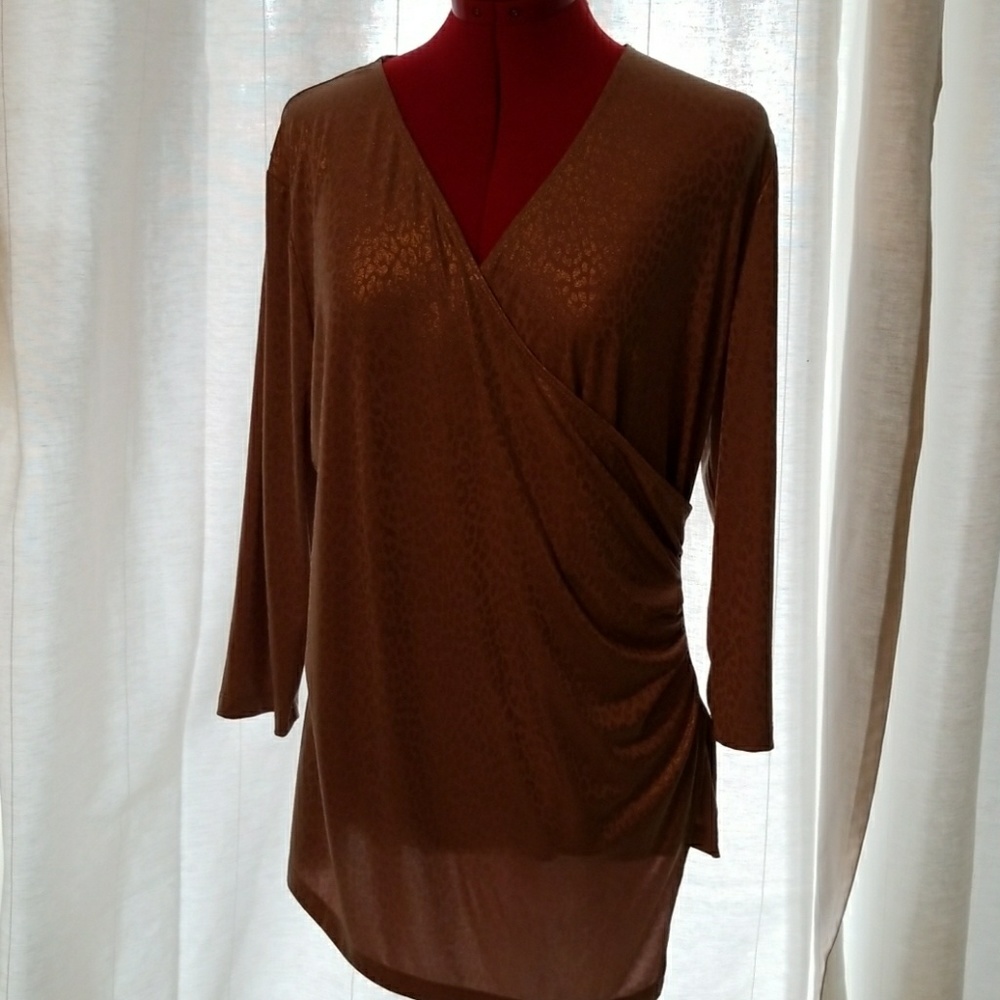 Beautiful gold prints chicks like new blouse.