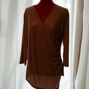 Beautiful gold prints chicks like new blouse.