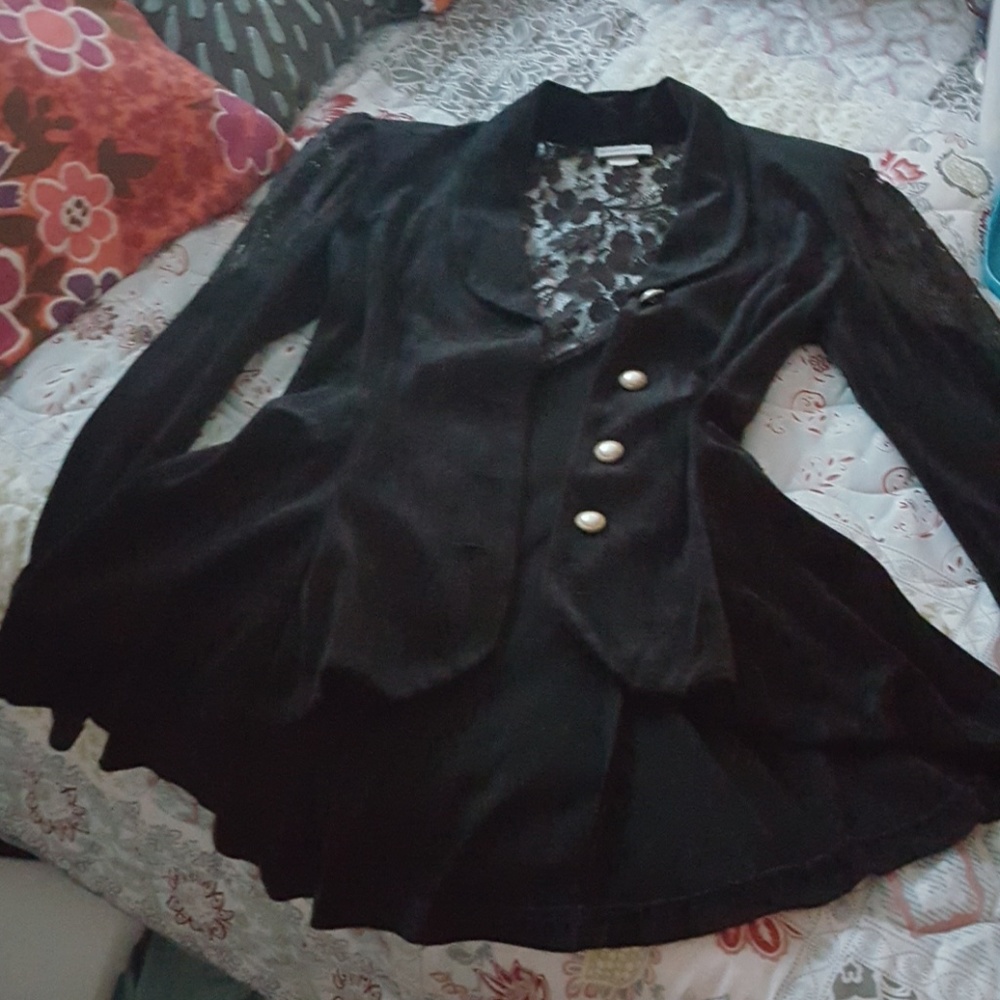 A vintage beautiful elegant black velvet jacket